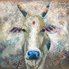 A limited edition giclee print of an white Indian cow wearing a necklace with holy red tika on her forehead. There is bold 'silver blush' block print through the background.