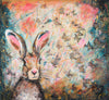 A limited edition giclee print of a kind looking hare against a richly decorated background embellished with butterflies. This image has a wonderful sense of softness and kindness that touches my heart