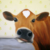 A photographic print of a jersey cow against a drab 70's style wallpaper.  The cow is looking very nonchalant. (Am I bothered?)