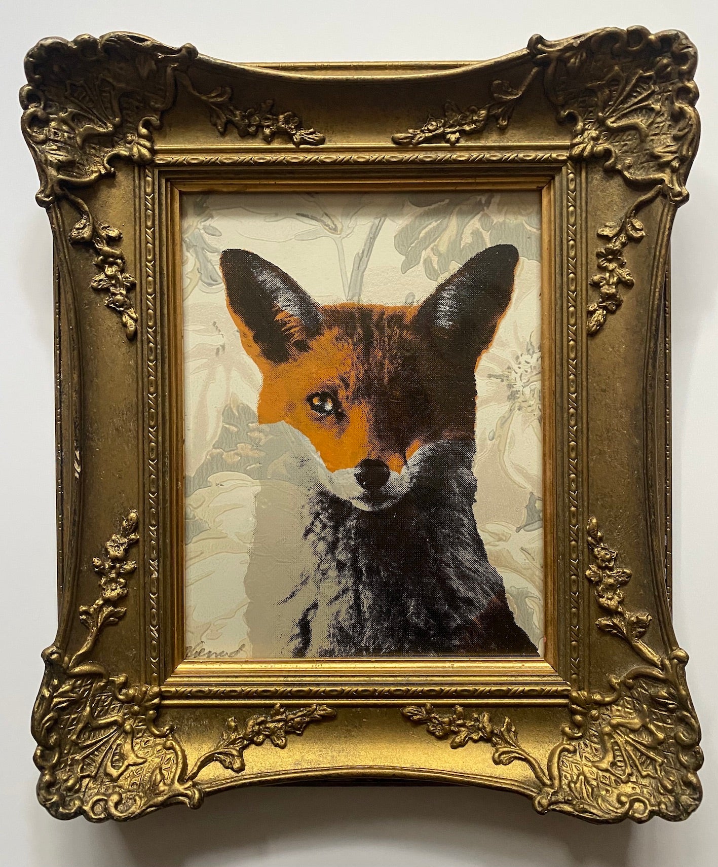 Foxy in dusty flowers  is a hand pulled screen print on wallpaper sample in a vintage gold frame.  I created work as part of my collection of upcycled artworks. Each print is hand pulled on a unique surface making each piece in the collection a 1/1.
