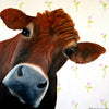 A photographic print of a ginger cow entering the frame from the left against a  70's style flock wallpaper.