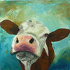 A limited edition giclee print of a brown and white cow on a turquoise and gold background on archival fine art paper. This is a very beautiful and popular choice for any real cow lover.
